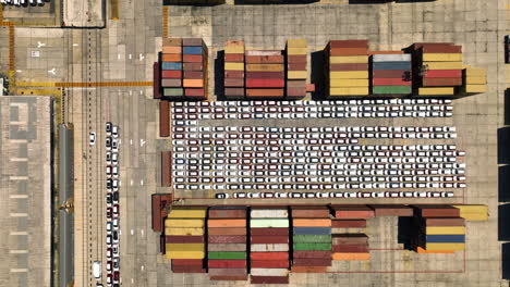 Top-down-drone-shot-above-the-cars-and-containers-at-the-Port-of-Mazatlan,-Mexico