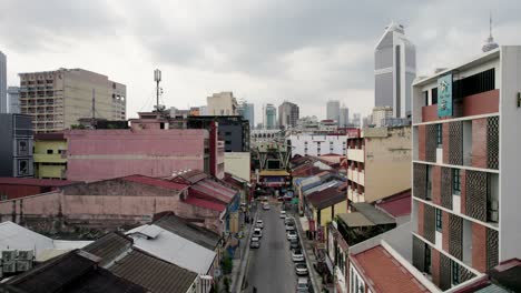 Petaling-Street-Drone-Push-Forward-Showing-Neighborhood-and-the-Markets-Green-Roof