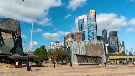 Timelapse,-Melbourne-Australia,-People-and-Buildings-on-Federation-Square-on-Sunny-Day