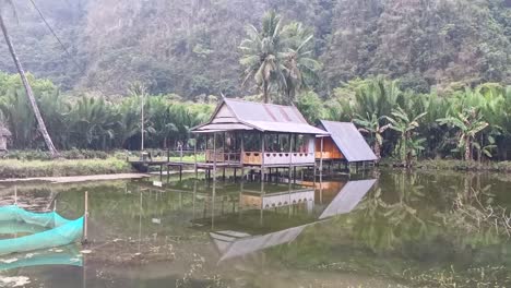 Old-house-in-the-geological-site-area-in-Ramang-Ramang-village,-Maros,-South-Sulawesi,-Indonesia