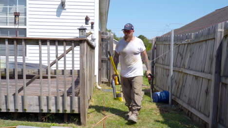 Man-walking-pointing-to-his-next-project