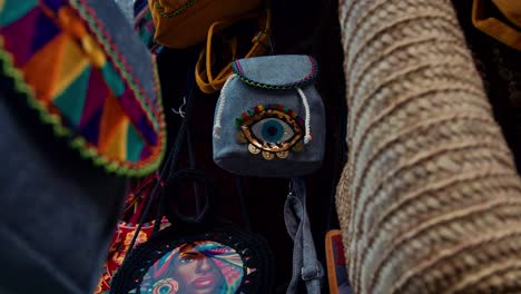 Artistic-hand-bags-and-accessories-at-the-hand-craft-store-in-the-market-street-of-Nubian-Village,-Aswan,-Egypt