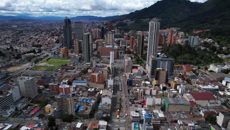 Establishing-drone-shot-of-skyscrapers-in-Downtown-Bogota,-sunny-day-in-Colombia