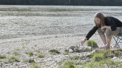 A-self-made-bonfire-site,-made-out-of-rocks