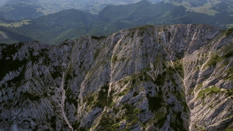 The-majestic-piatra-craiului-mountains-with-lush-greenery,-aerial-view