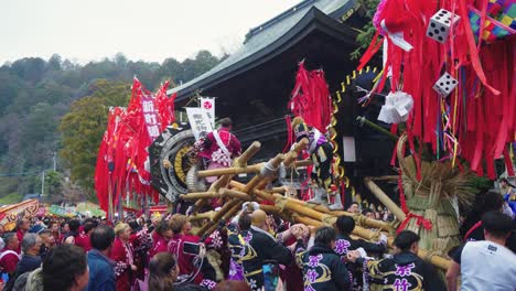 Japanese-people-in-festival-costumes-take-part-in-traditional-battle-between-town-districts