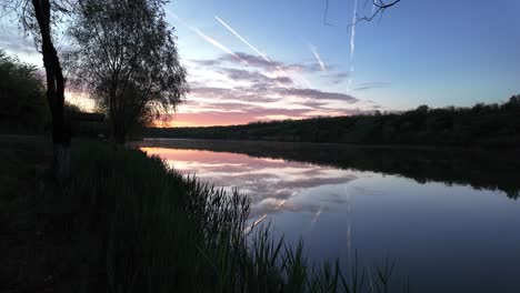 Sunrise-over-Fish-Pond:-Lush-Greenery-and-Calm-Water