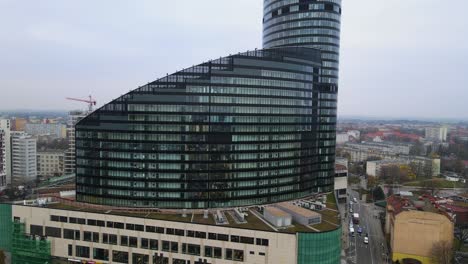 Aerial-view-from-down-to-the-top-on-skyscraper-Sky-Tower-in-Wrocław-city