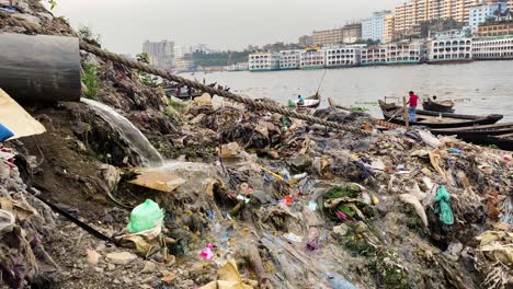 Sewage-With-Water-Waste-Towards-the-Buriganga-River-In-Dhaka,-Bangladesh,-Asia