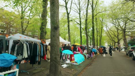 Apollolaan-Amsterdam-Old-South-stalls-in-the-rain-during-King's-day-celebration