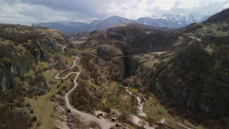 Rocky-landscape-of-Montenegro-with-a-valley-through-which-roads-lead