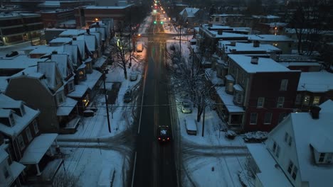 Historic-street-in-American-city-in-New-England-during-winter-night-with-snow