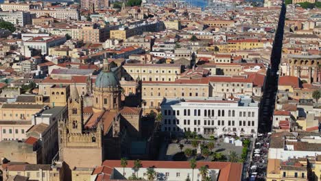 Birds-Eye-Drone-Shot-Reveals-Palermo-Cathedral-and-Piazza-on-Busy-Day-in-Sicily