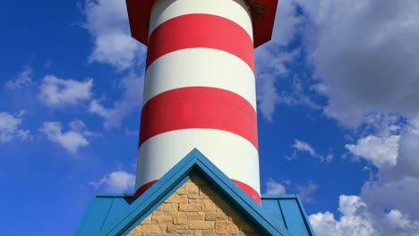 Port-Of-Grafton-Lighthouse-Panning-Up-with-Blue-Skies-with-Clouds,-Illinois,-USA
