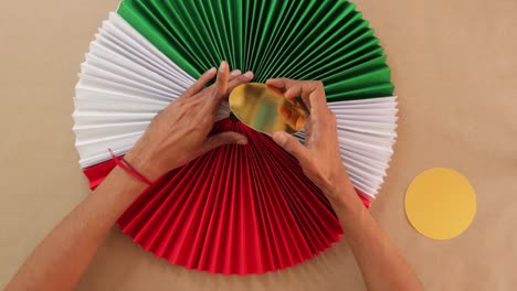 Making-traditional-Mexican-rosette,-colorful-paper-art