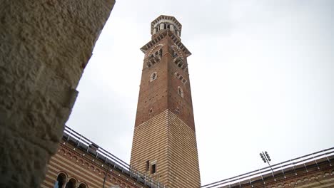 Low-angle-view-of-the-Lamberti-tower-in-famous-historical-italian-town-of-Verona