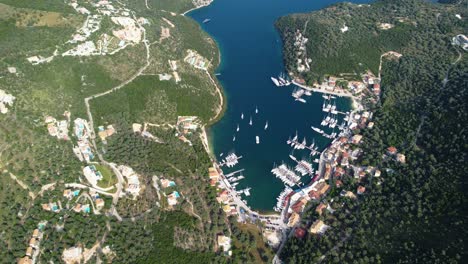 Aerial-Orbital-Panoramic-View-over-Picturesque-Sivota-Town-Bay,-Greece