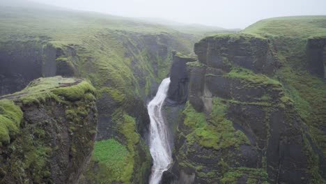 Moody-green-canyon-and-river-in-Iceland---Slow-motion