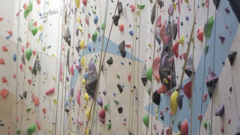 Wide-shot-of-a-vibrant-indoor-climbing-gym-wall