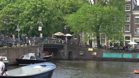 Tourist-boat-cruising-in-canal