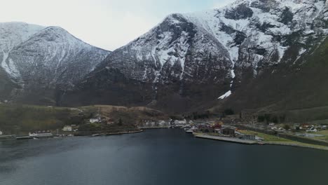 Drone-shot-of-Falm-town-in-Norway-during-winter-in-the-morning-with-fjords