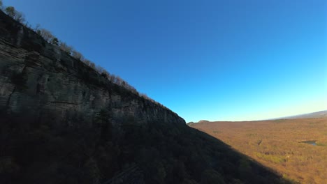 An-aerial-FPV-drone-shot-in-the-mountains-in-upstate-NY-on-a-sunny-day