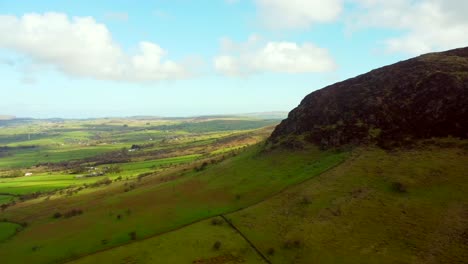 Aerial-shot-of-Slemish-Mountain,-situated-in-Broughshane,-County-Antrim-in-Northern-Ireland