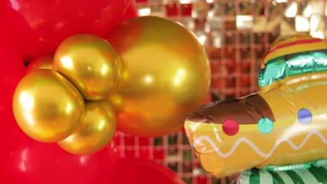 Red-and-Gold-Balloons-Against-a-Glowing-Golden-Background