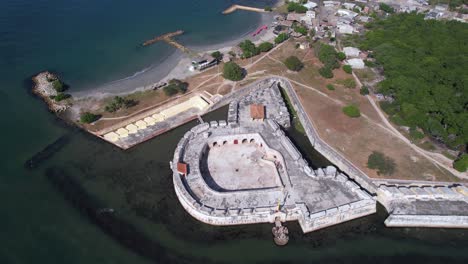 Aerial-View-of-San-Fernando-Castle-and-Fort-on-Bocachica-Island,-Cartagena,-Colombia,-Drone-Shot