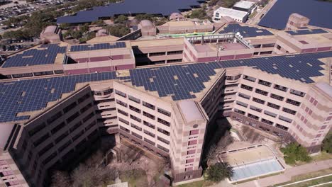 Aerial-View-of-Michael-E-DeBakey-VA-Medical-Center,-Veterans-Hospital-in-Houston-TX-USA,-Rooftop-Solar-Panels-Drone-Shot