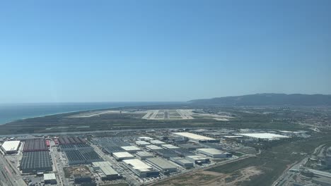 POV-immersive-pilot-perspective-of-Barcelona-airport-in-Spain,-shot-from-a-jet-approaching-to-the-airport