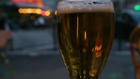 Close-up-on-a-beer-in-Paris,-France