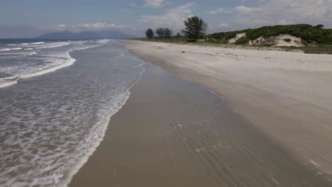 Deserted-beach-waves,-ilha-comprida,-são-paulo,-brazil,-aerial-drone-push-in-parallel