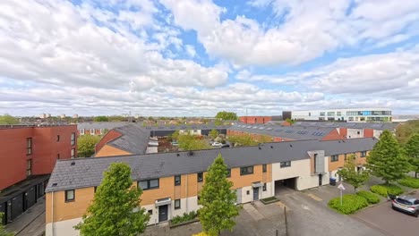 Clouds-time-lapse-passing-over-busy-Enfield-lock-housing-apartments-on-the-London-city-suburbs