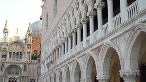 Doge's-Palace-in-Piazza-San-Marco-of-Venice-on-Early-Spring-Morning-with-People-Rushing-to-Work