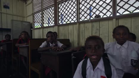 Indonesian-children-singing-in-gymnasium-classroom-village-Papua-Indonesia