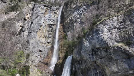 Bird's-eye-view-of-the-stunning-Seerenbachfälle-waterfalls-in-Amden-Betlis,-Switzerland,-one-of-the-tallest-waterfalls-in-Europe