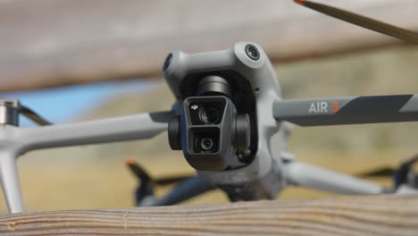Close-up-shot-of-gimbal-camera-on-DJI-Air-3-stabilize-as-it-turns-on