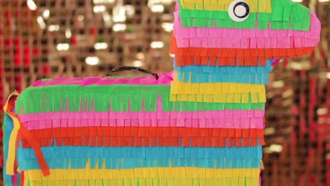 Colorful-paper-burrito-pinata,-close-up-isolated-party-decor