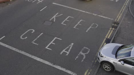 Busy-Top-Down-Shot.-Keep-Clear,-Road-Markings