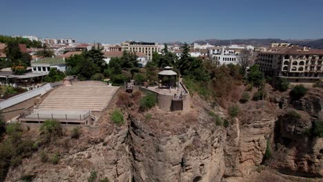 aerial-dolly-out-video-of-the-most-ancient-city-of-Ronda,-Andalusia,-Spain-panoramic-view