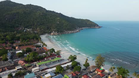 Full-Moon-Party-beach-on-Koh-Pha-Ngan-in-Thailand-before-sunset---drone-shot