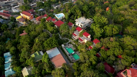 Slow-motion-cinematic-drone-reveal-of-beautiful-beach-resort-and-ocean