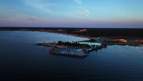 Aerial-view-of-the-Keskuskari-island-with-Kalajoki-dunes-background,-sunset-in-Finland