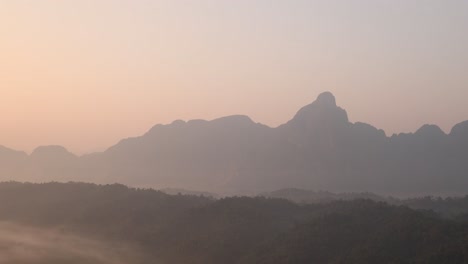 Mountain-peaks-at-sunrise-in-Vang-Vieng,-the-adventure-capital-of-Laos