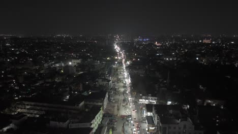 Aerial-shot-of-the-Chennai-Highway-lit-with-lights-and-traffic-on-the-road