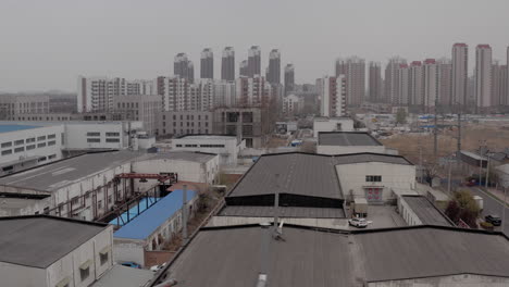 Residential-communities-next-to-the-industrial-zone-in-Tianjin,-China