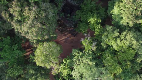 Cambodia-aerial-rises-above-overgrown-Khmer-jungle-temple-at-Koh-Ker