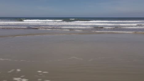 Deserted-beach-waves,-ilha-comprida,-são-paulo,-brazil,-aerial-drone-pan-right