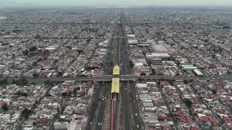 Drone-view-of-Ecatepec-neighborhood,-Av-Central,-CDMX-Suburbs